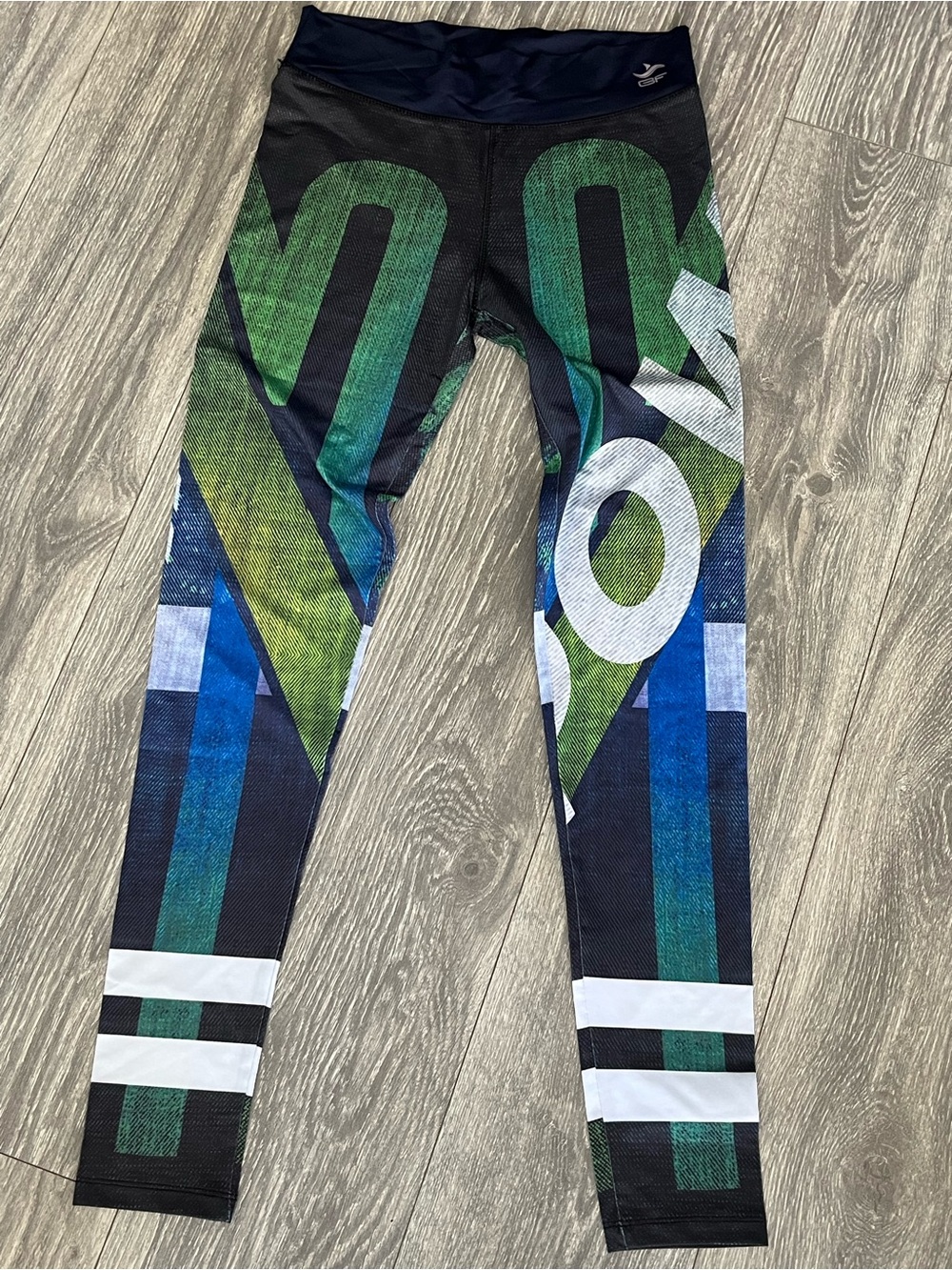 Women Green & Blue Graphic Leggings - Athletic Performance